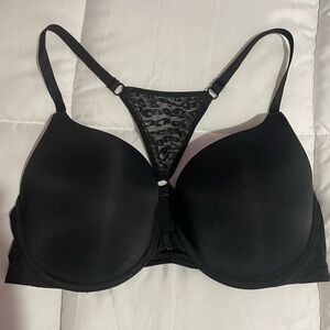 Victoria’s Secret Black T-back bra with lace detail, hooks in front. Size 36D